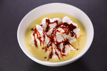 bowl of floating island with caramel