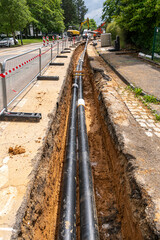 Obraz premium Travaux de voirie pour le chauffage urbain. Extension d'un réseau de chaleur. Pose de canalisations enterrées