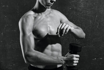 Fototapeta na wymiar sports man inflated torso posing black and white photo fitness