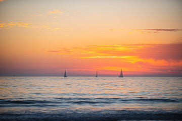 Sunset at the sea. Sunrise at beach. Colorful ocean beach sunrise.