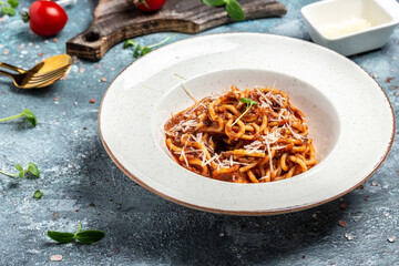 Pasta with meat, tomato sauce and vegetables, Italian pasta bolognese. banner, menu, recipe place for text, top view