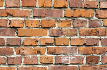 Old brick wall, red brick, texture, with light cement joints