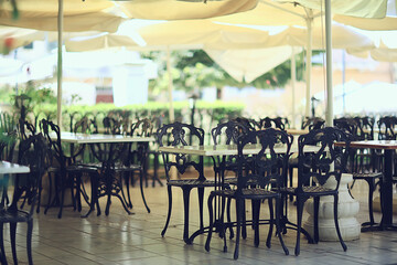 abstract blurred background street cafe in the city, no people, empty, summer restaurant quarantine