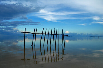 Wood stick fence in Belitung sea
