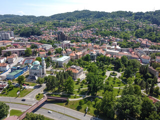 Fototapeta premium Aerial drone view of city of Tuzla, Bosnia and Herzegovina. Buildings, streets and residential houses. Tuzla is a town and municipality in north BiH, Europe. 