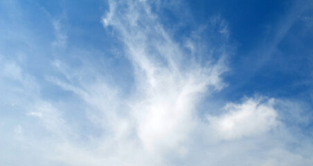 Blue sky background with clouds.