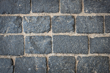 gray antique granite masonry, road paving, stone mill background, mock up for design, close up, stone texture