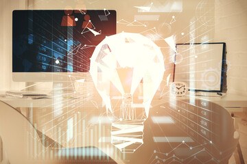 Double exposure of bulb and office interior background. Concept of idea.