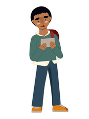 Young boy teenager with backpack playing on smartphone at school