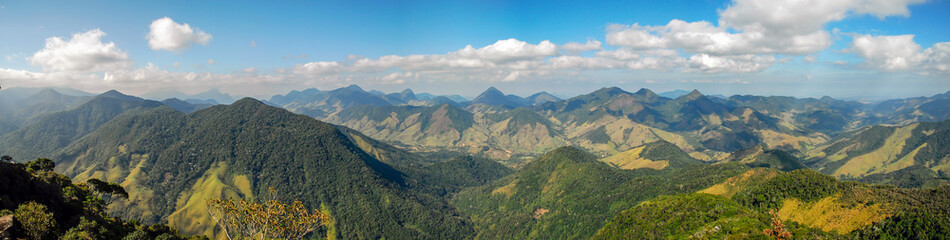 Fototapeta na wymiar Panoramic view of the mountainous region of Macae, from the Peito do Pombo stone, Arraial do sana, Macae district, State of Rio de Janeiro, Brazil