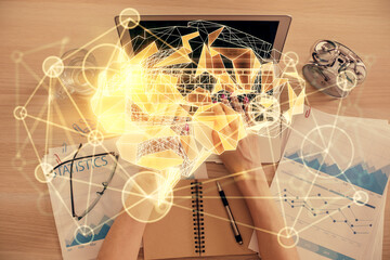 Double exposure of woman working on computer andhuman brain hologram drawing. Top View. Ai concept.