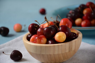 Yellow and red sweet cherries. Fresh ripe sour cherries.