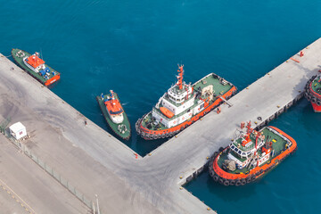 Tugs and Pilot boats are moored in Jeddah port, Saudi Arabia