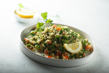Traditional Tabbouleh salad with parsley and tomato