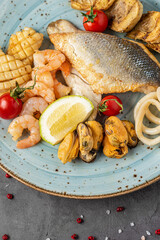 Mixed seafood platter with fish, squid, octopus, mussels and shrimp.