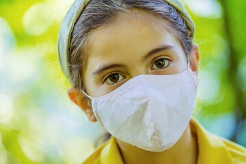 Little girl with mask