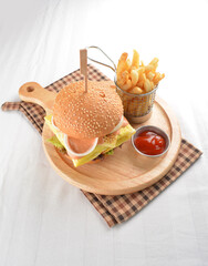 Malaysia ramly grilled chicken wrapped with egg omelette burger serve with French fries and sauce...