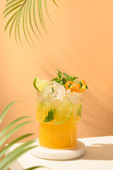 Classic freshness cocktail, mojito, lemonade or mai tai with lime, orange on modern still life on...