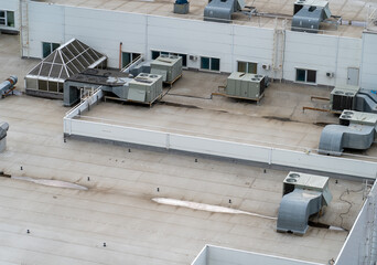 Exhaust vents of industrial air conditioning and ventilation units. Air conditioning system on roof...