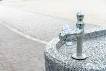 Obraz na płótnie Canvas 公園に設置されている水飲み場の写真
