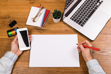 Business equipment on wooden table. Workplace and office concept. Top view.