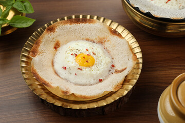 Sri lankan egg hopper, bittara aappa Appam popular breakfast Pancake Made With Fermented Rice Batter, Coconut Milk Sri Lanka South Indian  Kerala, Tamil Nadu. Indian veg food. 