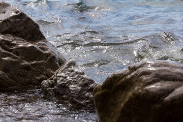 clear water stone rock sea. Stones and water background