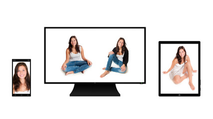 Fototapeta na wymiar A black tablet computer, a cellphone and a monitor with portraits of a beautiful young woman, isolated on white background