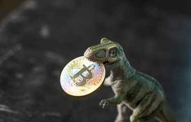 dinosaur holding bitcoin in its mouth