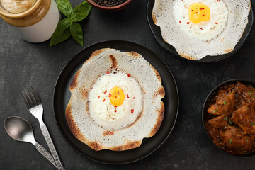 Sri lankan egg hopper, bittara aappa Appam popular breakfast Pancake Made With Fermented Rice Batter, Coconut Milk Sri Lanka South Indian  Kerala, Tamil Nadu. Indian veg food. 