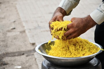 Making of street food and mix with fingers