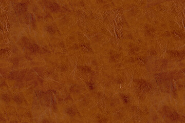 Closeup photo of abstract artificial brown leather background, seamless texture, pattern