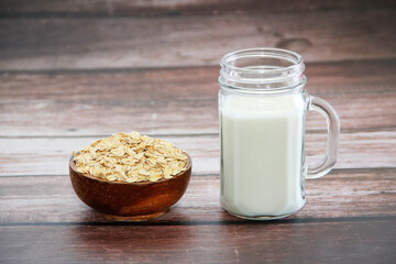 diet kefir in a glass mug and oat flakes