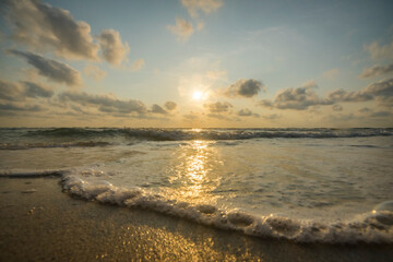 Bubble waves and morning sun at the southern sea, Thailand