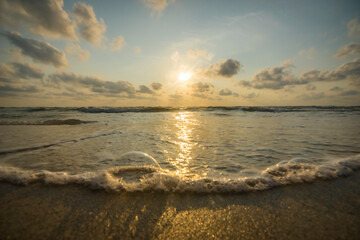 Bubble waves and morning sun at the southern sea, Thailand