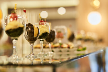 Vegetable snacks with seaweed for picking up from buffet for hotel system of all-inclusive. Vegetables stew with greenery