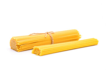 Top view of a bunch of bucatini or perciatelli - pasta, spaghetti strands isolated on white background.