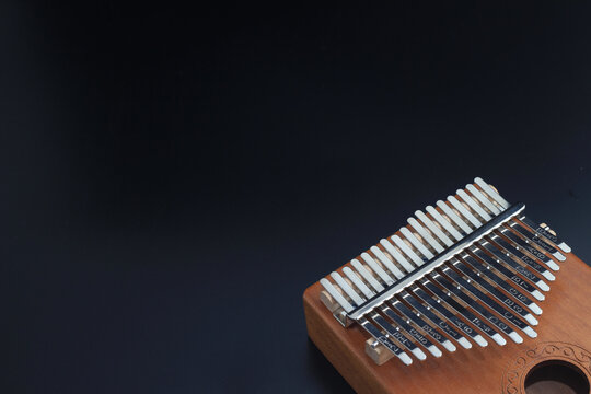 Top View, Kalimba, acoustic music instrument from africa at Black Background
