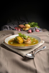 chicken with corn and potato hot soup Peruvian cuisine menu