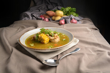 chicken with corn and potato hot soup Peruvian cuisine menu