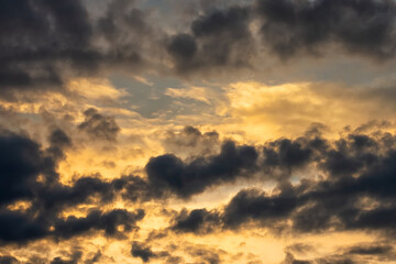 Beautiful clouds at sunset. Close-up. Natural background.