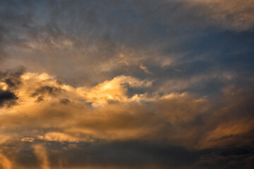 Beautiful clouds at sunset. Close-up. Natural background.