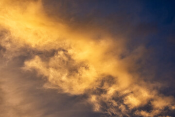 Beautiful clouds at sunset. Close-up. Natural background.