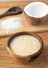 Creamy cocada, traditional brazilian coconut candy with grated coconut