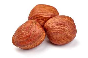 Hazelnuts, isolated on white background. High resolution image.