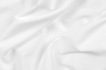 Abstract white fabric texture background. Cloth soft wave. Creases of satin, silk, and cotton.