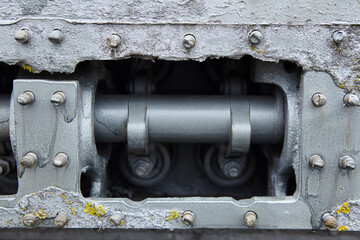 An old vintage mechanism of the unit or device. Technologies of the past, covered with old paint or rust.