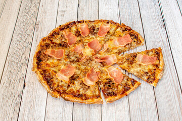 Small Fine Wheat Dough Pizza with BBQ Sauce with Huge Fried Bacon Slices and Minced Meat