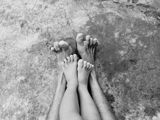feet of a father with his son