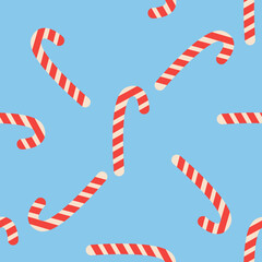Obraz premium Christmas candy cane stripes seamless pattern in red and white. Popular winter festive background